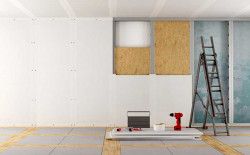 Pose de cloisons en plâtre par un professionnel pour modifier l'agencement d'un pavillon